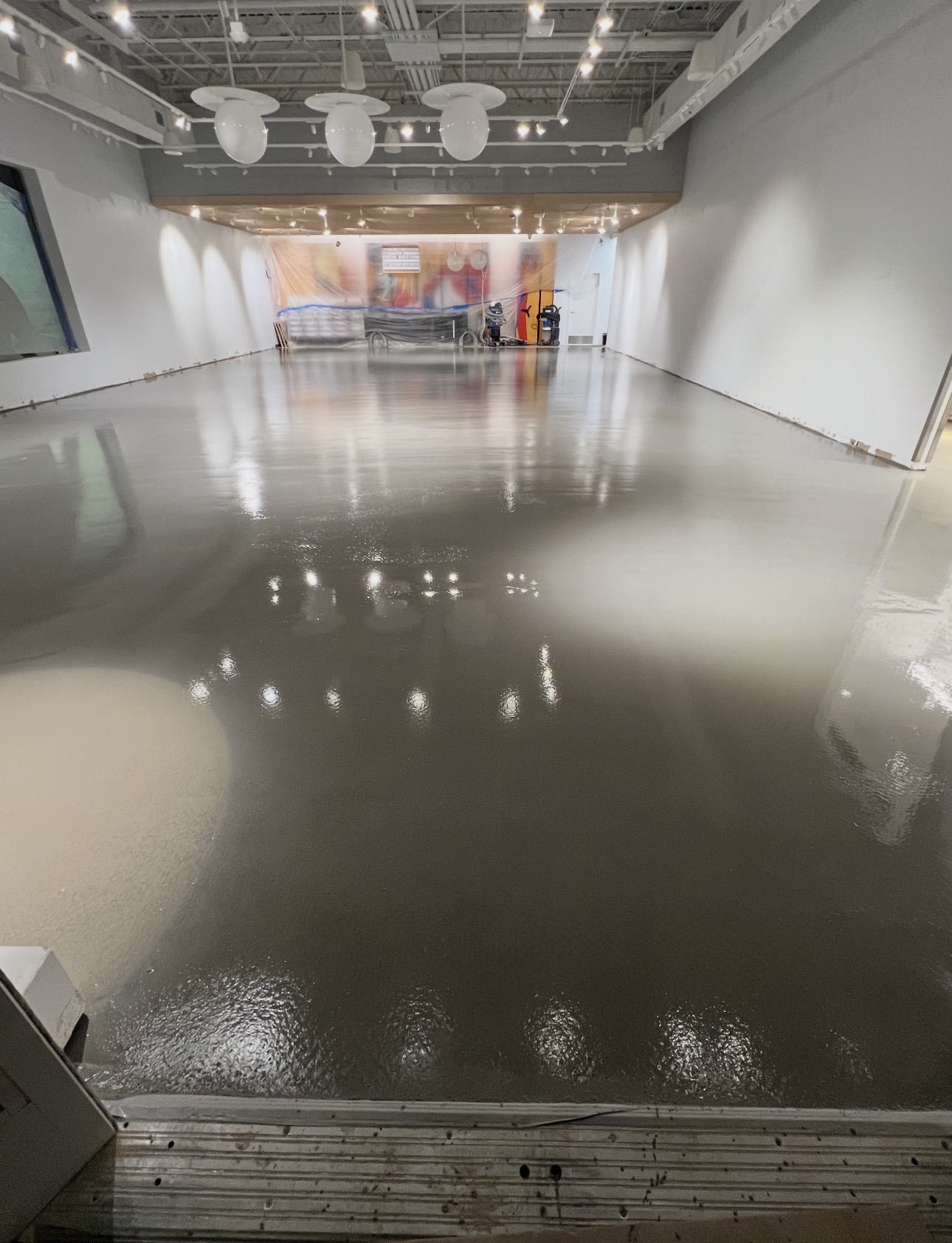 Freshly poured self-leveling coating with a wet reflective finish
