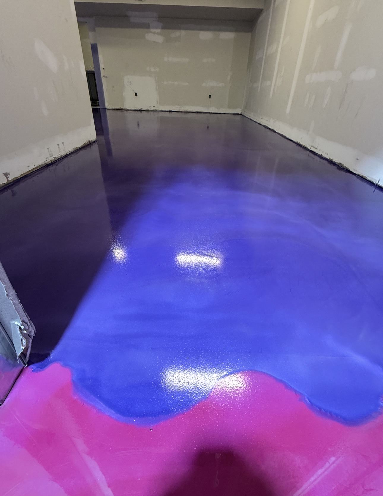 Purple and blue glossy epoxy coating during installation